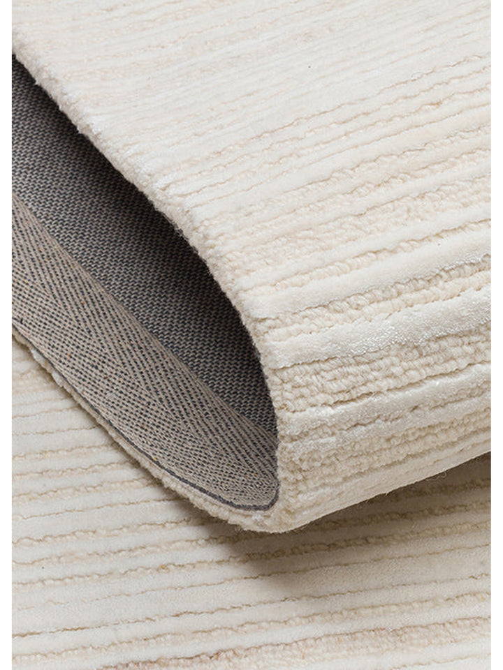 Alfombra tejida a mano de mezcla de lana y TENCEL™ serie Palermo CREAM