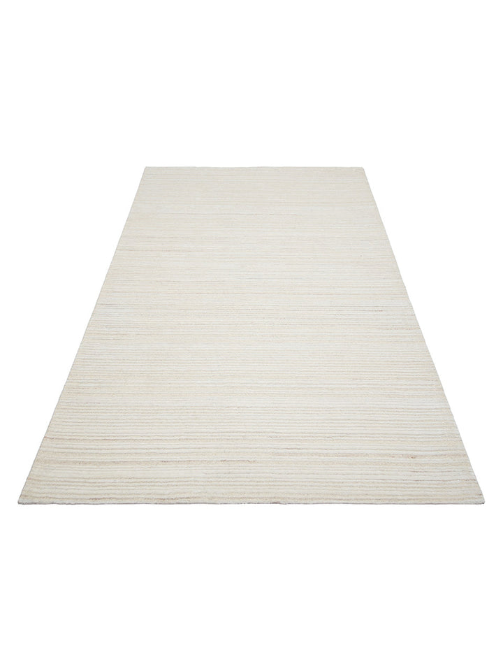Alfombra tejida a mano de mezcla de lana y TENCEL™ serie Palermo CREAM